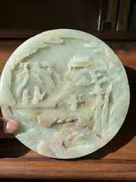 A Chinese celadon and russet jade plaque with landscape design, 19th C.