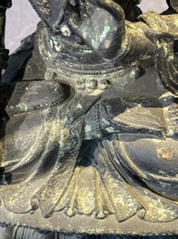 A large Chinese bronze sculpture of Bodhisattva on a lotus throne, Ming