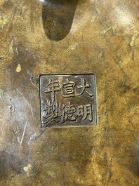 A Chinese imperial archaistic gold-splashed bronze censer and cover with chilong and 'shou' design, Xuande mark, 17th C.