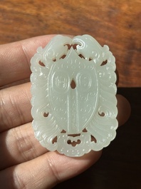 A Chinese white jade 'double phoenix' plaque, Qianlong mark and possibly of the period