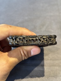 A Chinese jade carving, a tortoiseshell card holder and an iron-red snuff bottle, 19th C.