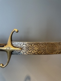 A silver plated dagger and four swords, China, Burma and Indonesia, 18/19th C.