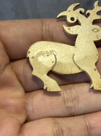 A rare Chinese calcified jade 'deer' pendant, Western Zhou