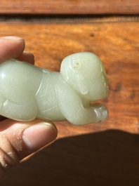 A Chinese white jade carving of a reclining boy, Qing