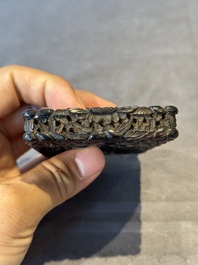 A Chinese jade carving, a tortoiseshell card holder and an iron-red snuff bottle, 19th C.