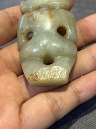 Three Chinese jades and an agate belt hook, Shang and later