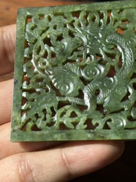 A Chinese jade 'dragon' plaque, a 'double-happiness' plaque and a jade inset silver brooch, 19th C.