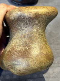 A Chinese scholar's rock on wooden stand, Ming or later