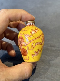 A Chinese jade snuff bottle and a yellow-ground iron-red snuff bottle, Daoguang mark, 19th C.