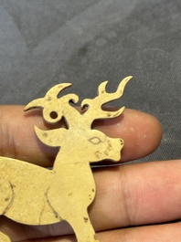 A rare Chinese calcified jade 'deer' pendant, Western Zhou