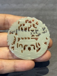 Two Chinese round jade plaques on carved wooden stands, 19th C.