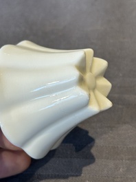 A pair of Chinese Dehua blanc de Chine flower-shaped cups, Kangxi