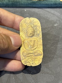 Four sheets of gold repouss&eacute; votive plaques of Buddha Sakyamuni, Burma, 12th C.
