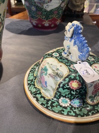 A pair of Chinese famille rose black-ground jars and covers with mountainous landscape design, Yongzheng