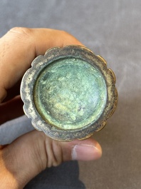 A rare Chinese ribbed bronze flower arranging vase, Ming