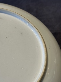 Two Chinese Canton famille rose 'mandarin subject' plates and a saucer, Qianlong
