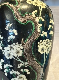 A Chinese famille verte black-ground vase and a pair of turquoise-glazed Buddhist lions, 19/20th C.