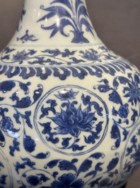 A Chinese blue and white 'lotus scroll' bottle vase, Transitional period