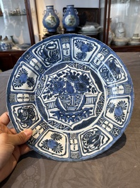 A Chinese blue and white kraak porcelain dish with flowers in a jardiniere, Wanli