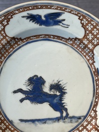 A pair of Chinese 'leaping pekinese' plates, possibly after a design by Cornelis Pronk, Qianlong, ca. 1740