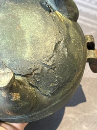 Two Chinese archaic bronze food vessels, 'ding 鼎', Han