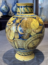 A large Italian maiolica drug jar with trophies, Casteldurante, 2nd half 16th C.