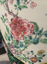 A pair of Chinese famille rose black-ground jars and covers with mountainous landscape design, Yongzheng