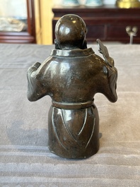 A Chinese bronze vase and a Taoist figure-shaped incense burner, Ming