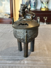 A fine Chinese bronze censer and cover with a Buddhist lion, 'ding 鼎', Xuande Mark, Ming