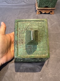A rare large and inscribed archaistic bronze wine vessel, 'fang yi 方彝', Song/Ming