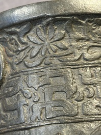 A Chinese bronze 'elephant' tripod censer and cover, Ming