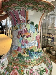 A pair of Chinese Canton famille rose vases with figures, flowers and insects, 19th C.