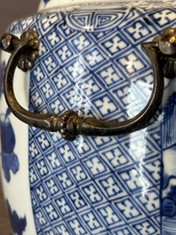 A fine Chinese blue and white 'landscape and antiquities' bowl with silver handles, Kangxi