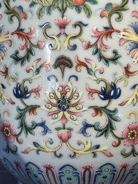 A pair of Chinese famille rose vases with floral design, Jiaqing mark, 19/20th C.