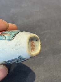 A Chinese famille rose snuff bottle with narrative design, Tongzhi mark and of the period