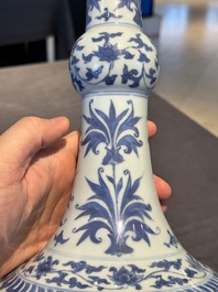 A Chinese blue and white 'lotus scroll' bottle vase, Transitional period