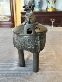 A fine Chinese bronze censer and cover with a Buddhist lion, 'ding 鼎', Xuande Mark, Ming