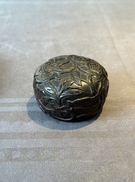 A Chinese huanghuali wooden box and cover with pomegranate design, 17/18th C.