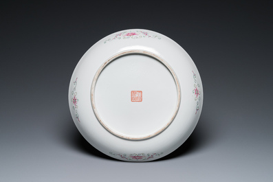 A Chinese famille rose yellow-ground 'dragon and phoenix' dish for the Straits or Peranakan market, Qianlong mark, 19th C.