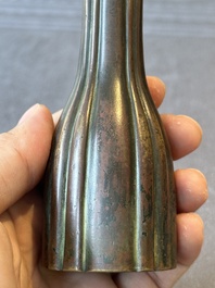 A rare Chinese ribbed bronze flower arranging vase, Ming