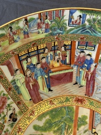 A large Chinese Canton famille rose bowl with a bronze stand, 19th C.