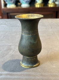 A rare Chinese parcel-gilt bronze ritual wine vessel, 'zhi 觯', Ming