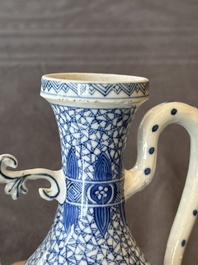 A pair of Chinese blue and white ewers with floral design, Kangxi