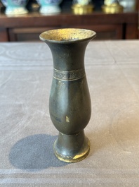 A rare Chinese parcel-gilt bronze ritual wine vessel, 'zhi 觯', Ming