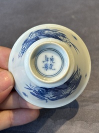 A Chinese blue and white 'erotic' cup and saucer, Kangxi