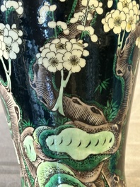 A Chinese famille verte black-ground vase and a pair of turquoise-glazed Buddhist lions, 19/20th C.