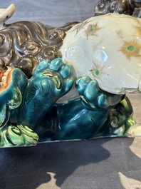 A Japanese polychrome-glazed group of playing Buddhist lions, 18/19th C.
