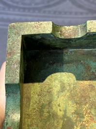 A rare large and inscribed archaistic bronze wine vessel, 'fang yi 方彝', Song/Ming