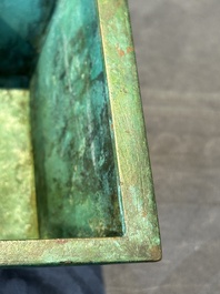 A rare large and inscribed archaistic bronze wine vessel, 'fang yi 方彝', Song/Ming