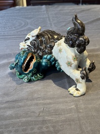 A Japanese polychrome-glazed group of playing Buddhist lions, 18/19th C.